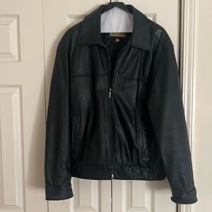 Men’s genuine leather jacket only worn twice. Size Large.